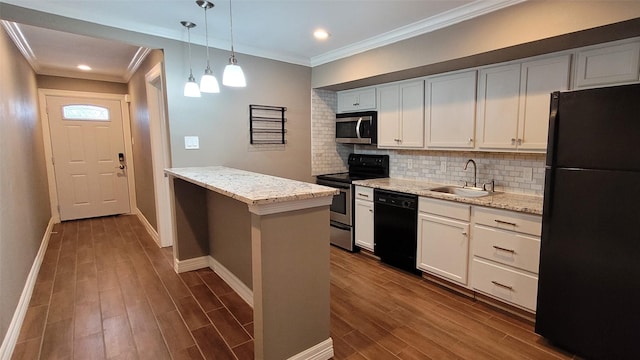 kitchen featuring dark wood-style floors, a sink, backsplash, and black appliances