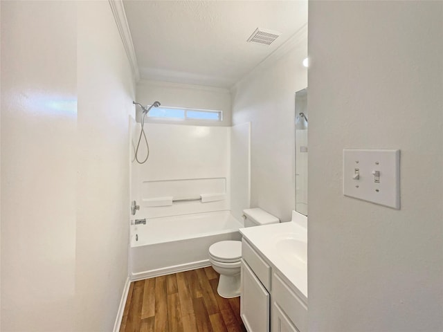 full bathroom with toilet, ornamental molding, wood finished floors, and visible vents