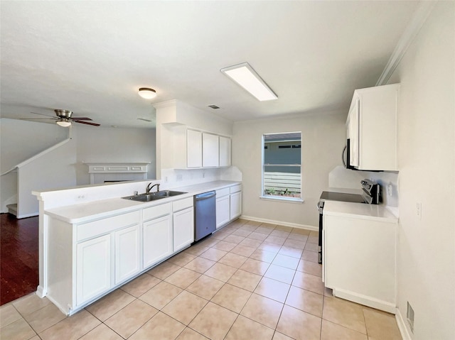 kitchen with ceiling fan, light tile patterned floors, a sink, appliances with stainless steel finishes, and white cabinetry
