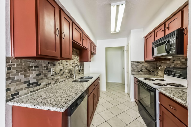 kitchen featuring black microwave, electric range oven, light tile patterned floors, stainless steel dishwasher, and a sink