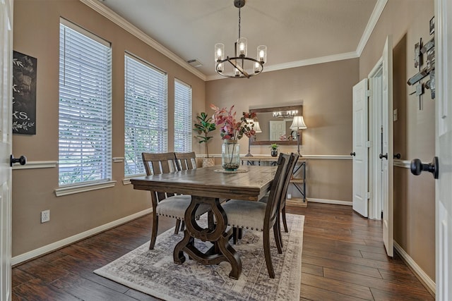 dining area with wood finished floors, a notable chandelier, and ornamental molding