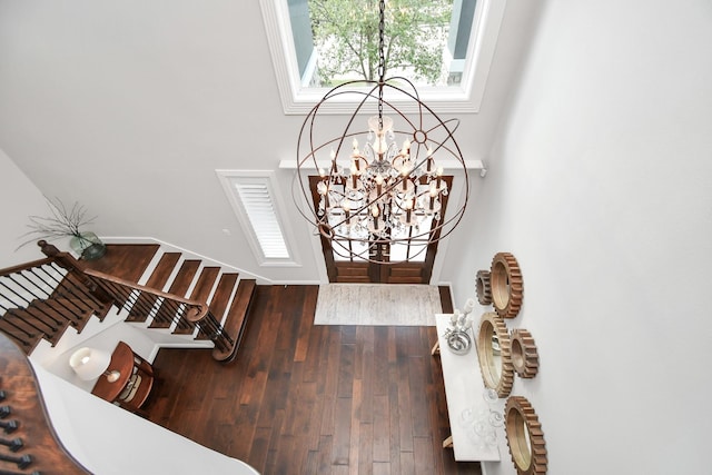 foyer featuring wood finished floors