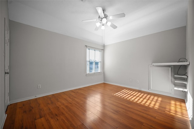 9406 Laurel Wind Ct, Houston, TX 77040 - empty room with a ceiling fan and wood finished floors