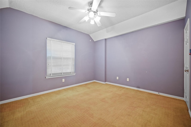 9406 Laurel Wind Ct, Houston, TX 77040 - empty room featuring light colored carpet, a ceiling fan, and lofted ceiling