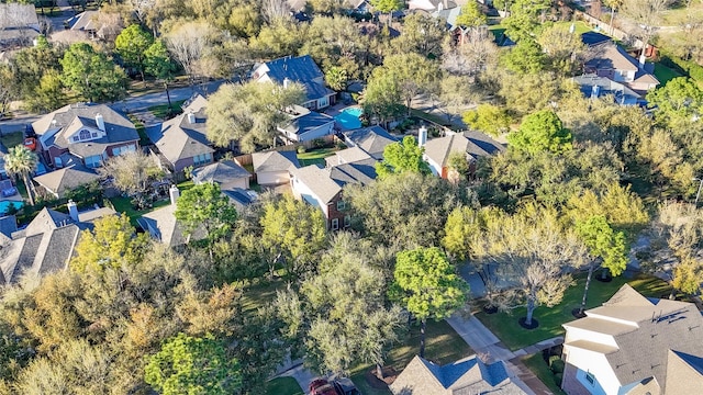 birds eye view of property with a residential view