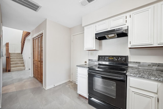 kitchen featuring visible vents, black range with electric stovetop, under cabinet range hood, and light stone countertops