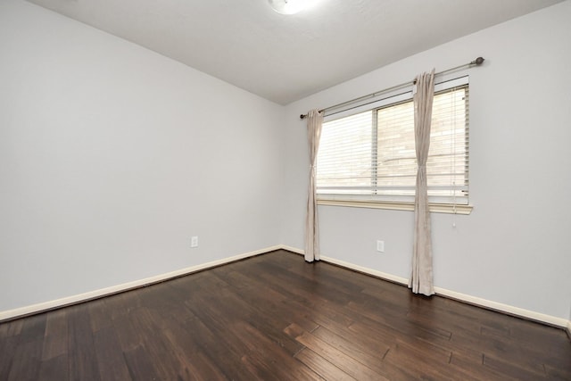10138 W Palm Lake Dr, Houston, TX 77034 - empty room featuring baseboards and dark wood-style flooring