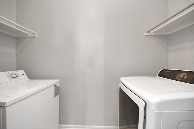 10138 W Palm Lake Dr, Houston, TX 77034 - laundry area with laundry area and washing machine and dryer