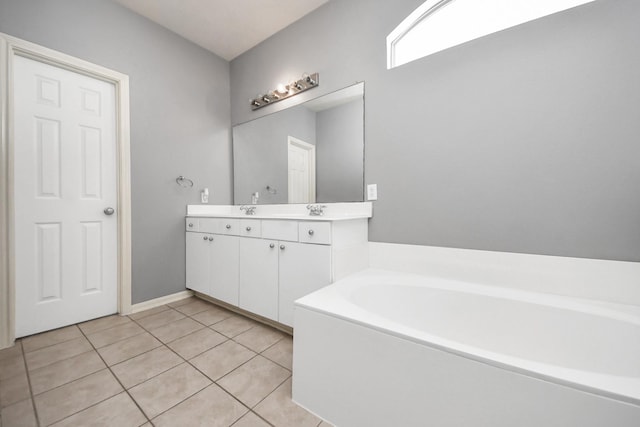 10138 W Palm Lake Dr, Houston, TX 77034 - full bath featuring double vanity, a garden tub, a sink, and tile patterned floors