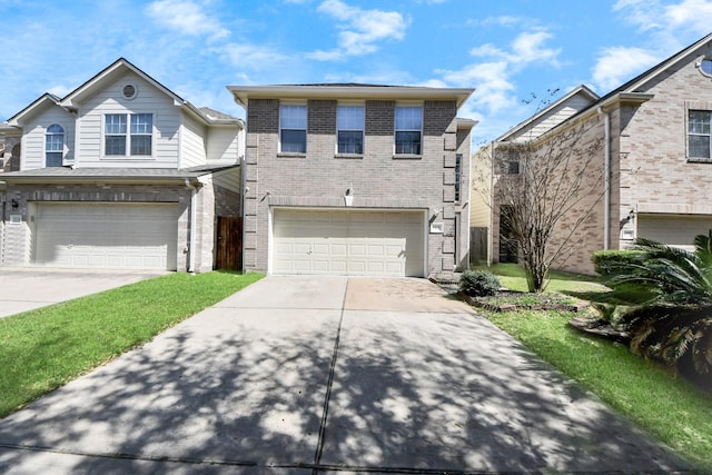 view of front of home featuring a garage, concrete driveway, and brick siding