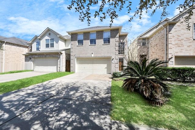 10138 W Palm Lake Dr, Houston, TX 77034 - view of front of property with a garage, concrete driveway, and brick siding