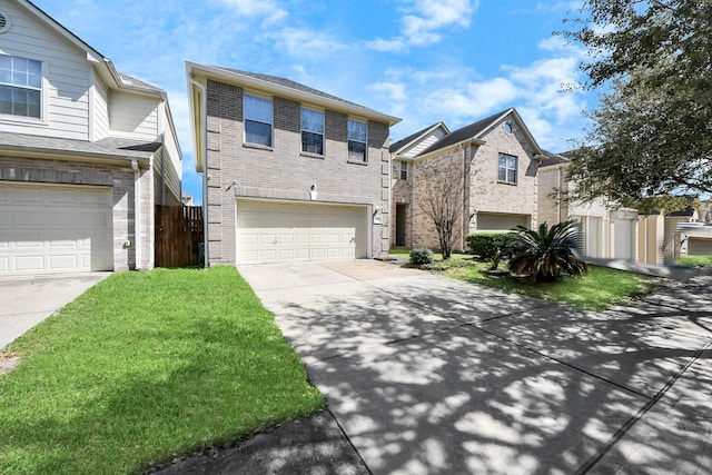 10138 W Palm Lake Dr, Houston, TX 77034 - view of front of property featuring a garage, driveway, a front yard, and brick siding