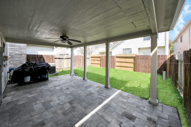 10138 W Palm Lake Dr, Houston, TX 77034 - view of patio / terrace with a fenced backyard and ceiling fan