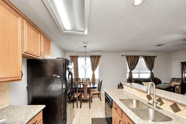 10138 W Palm Lake Dr, Houston, TX 77034 - kitchen featuring open floor plan, black appliances, a sink, and light countertops