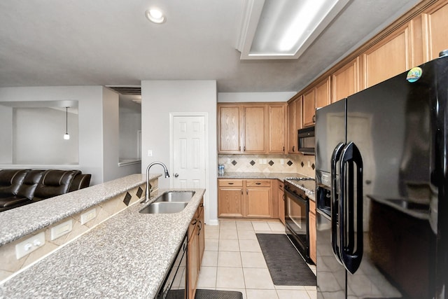 10138 W Palm Lake Dr, Houston, TX 77034 - kitchen featuring tasteful backsplash, light stone countertops, black appliances, a sink, and light tile patterned flooring