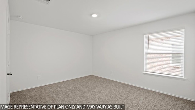 view of carpeted spare room