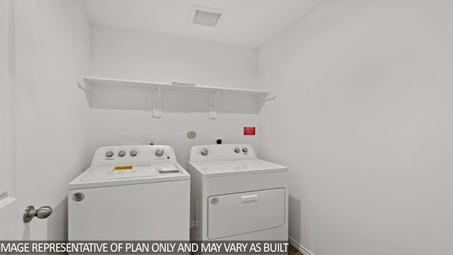 clothes washing area with laundry area and washing machine and dryer