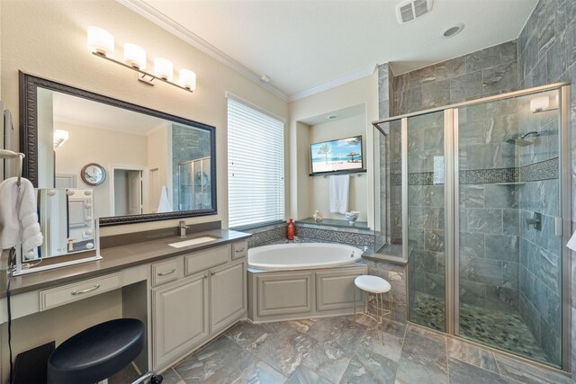 full bathroom with vanity, visible vents, ornamental molding, a shower stall, and a garden tub