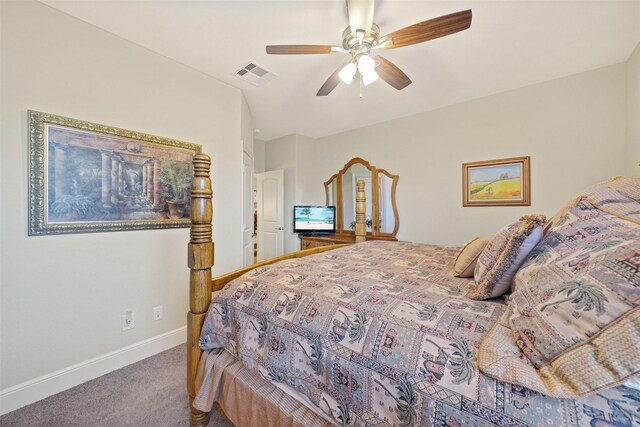 bedroom with visible vents, carpet floors, baseboards, and ceiling fan