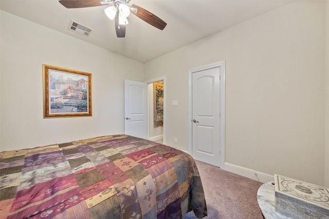 bedroom featuring visible vents, baseboards, a ceiling fan, and carpet flooring