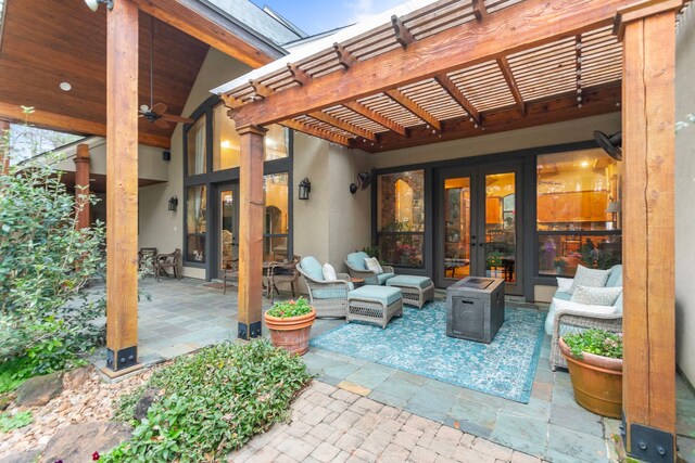 view of patio / terrace with french doors and a pergola