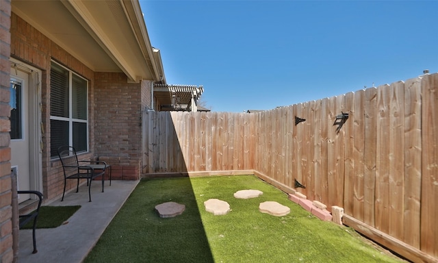 view of yard featuring a fenced backyard