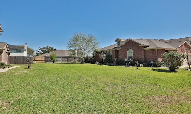 view of yard with fence