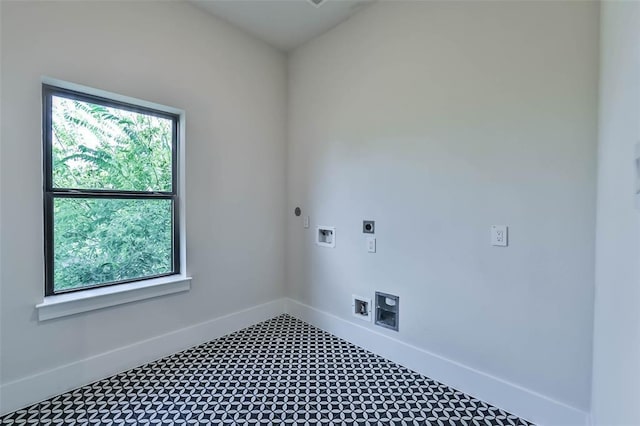 laundry room with hookup for a washing machine, laundry area, electric dryer hookup, and baseboards