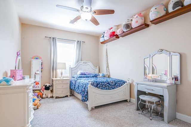 bedroom with baseboards, carpet, and a ceiling fan