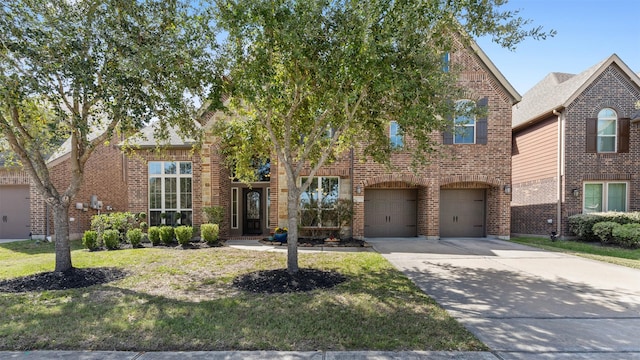 view of front of home featuring concrete driveway, an attached garage, brick siding, and a front lawn