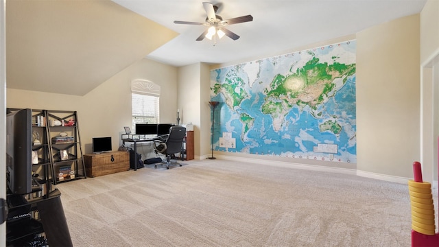 office area with baseboards, carpet, ceiling fan, and vaulted ceiling