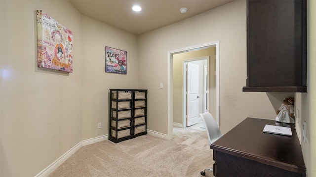 home office with recessed lighting, light colored carpet, and baseboards