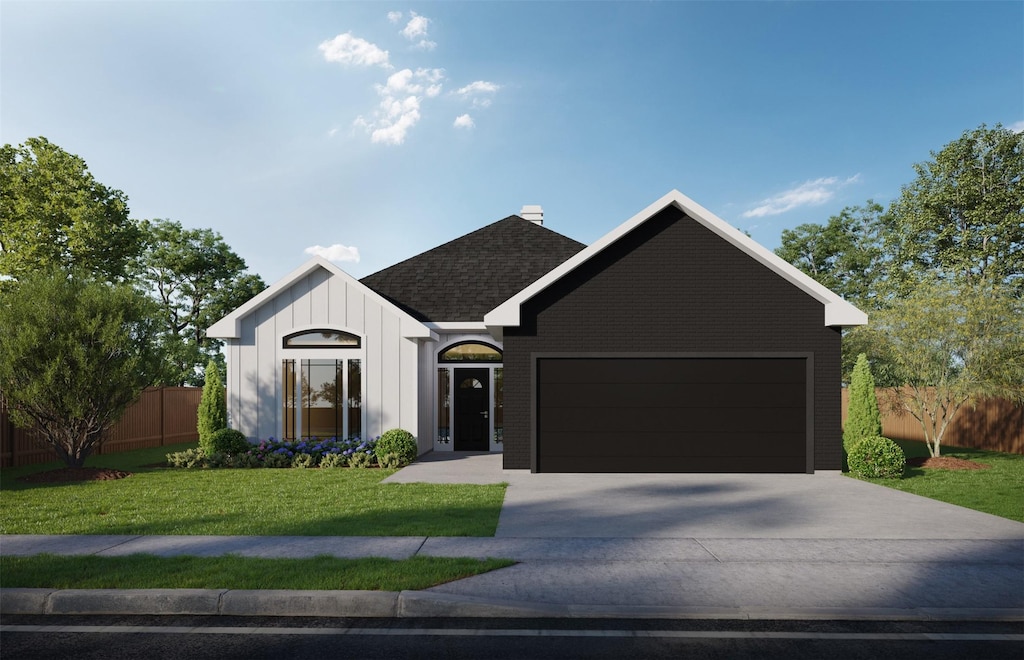view of front of property featuring driveway, a front lawn, fence, a garage, and a chimney