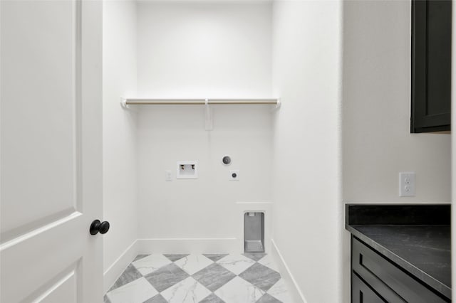 washroom featuring hookup for a washing machine, baseboards, marble finish floor, cabinet space, and electric dryer hookup