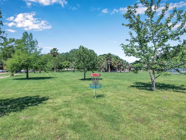 view of home's community featuring a lawn