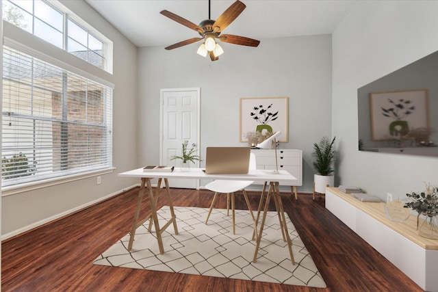 office space with a ceiling fan, baseboards, and wood finished floors