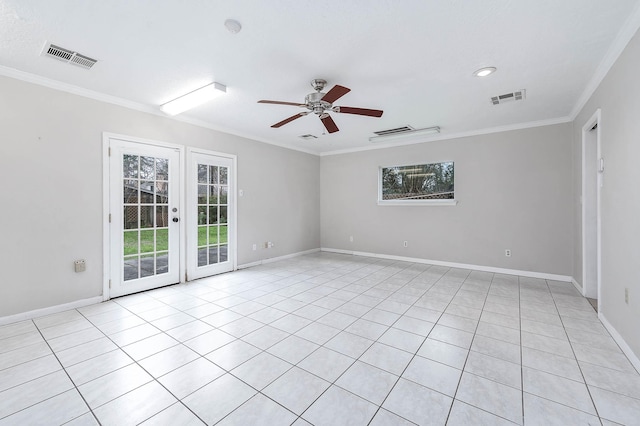 spare room featuring ceiling fan, french doors, ornamental molding, and visible vents