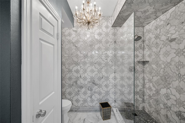 full bath featuring toilet, marble finish floor, a walk in shower, and an inviting chandelier