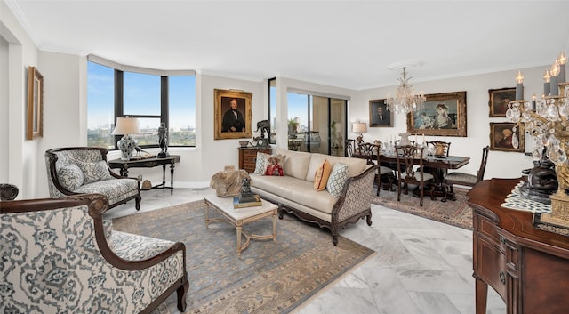 living room with marble finish floor, crown molding, baseboards, and a notable chandelier