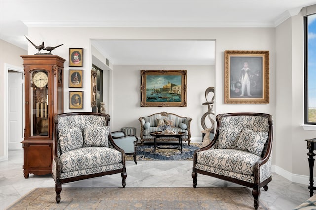 living area with marble finish floor, baseboards, and ornamental molding