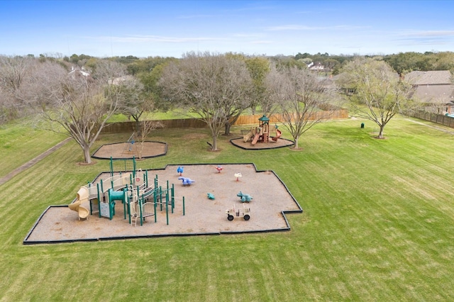 exterior space with a yard and fence