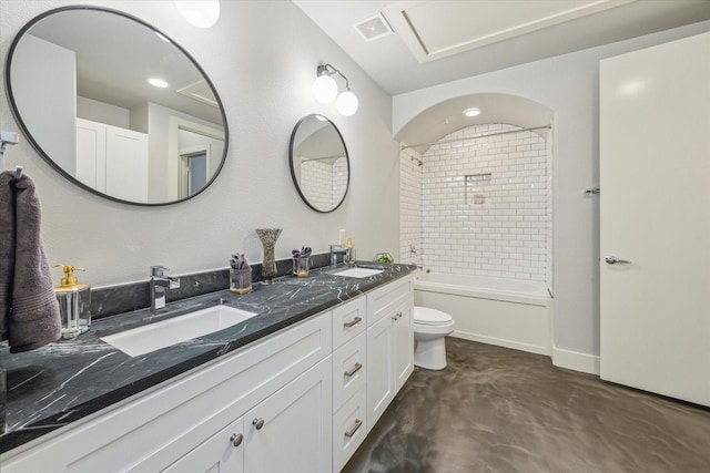 bathroom featuring visible vents, shower / washtub combination, toilet, and a sink