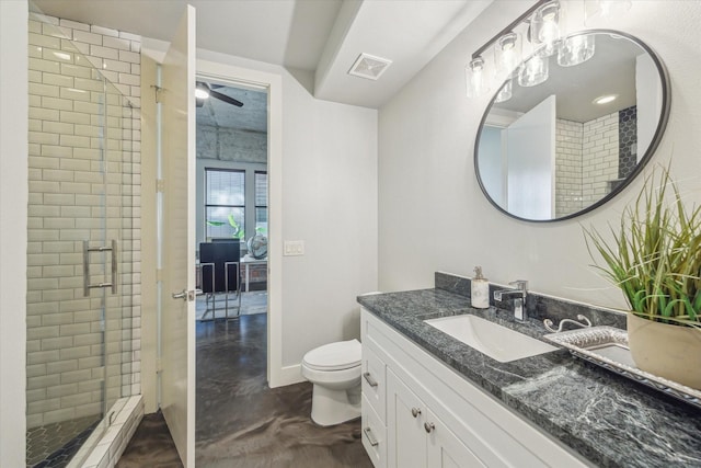 full bathroom with visible vents, a shower stall, ceiling fan, toilet, and vanity