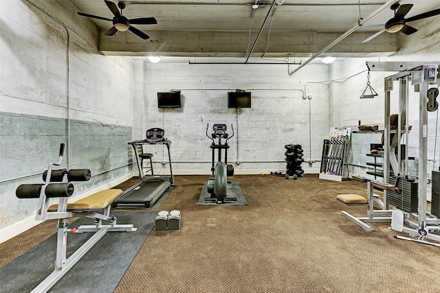 exercise room with ceiling fan