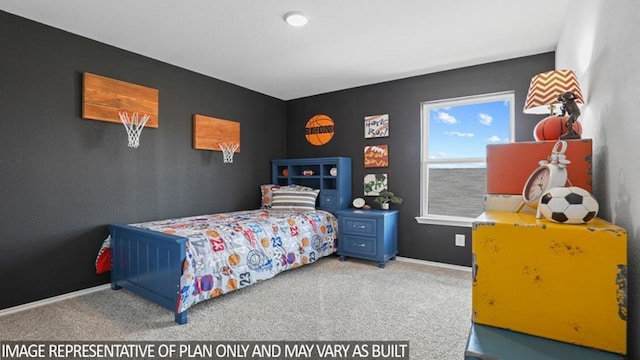 carpeted bedroom featuring baseboards