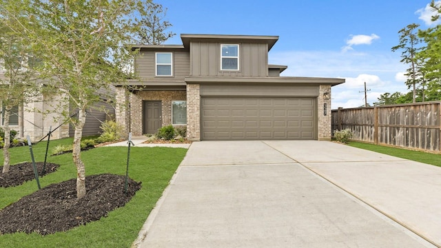 1507 Portia Ct, Conroe, TX 77301 - view of front of home featuring brick siding, board and batten siding, driveway, and an attached garage