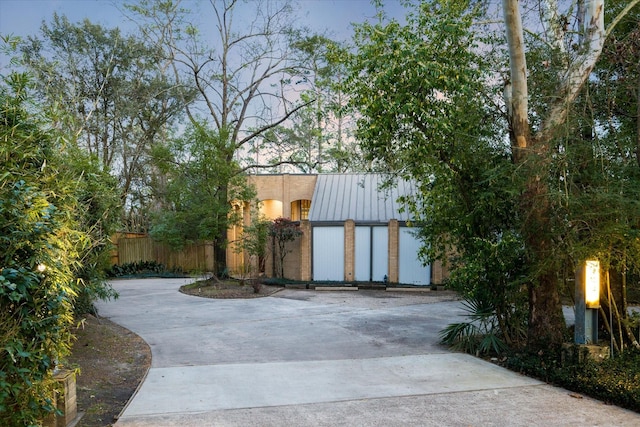 view of gate featuring fence