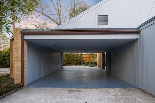 garage featuring a carport