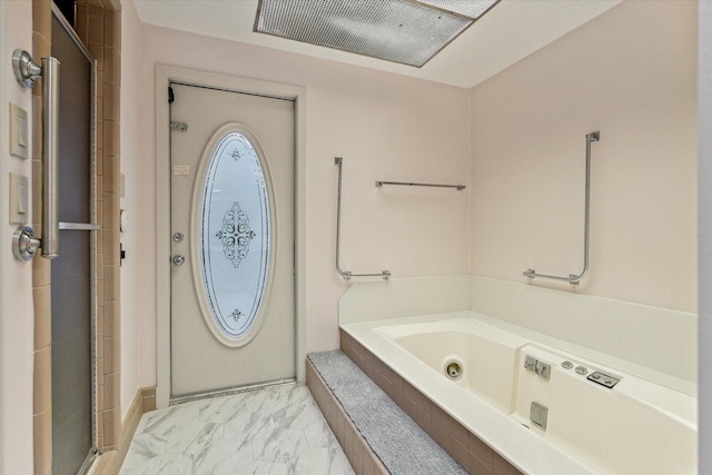 full bath with marble finish floor, visible vents, a jetted tub, and a shower stall