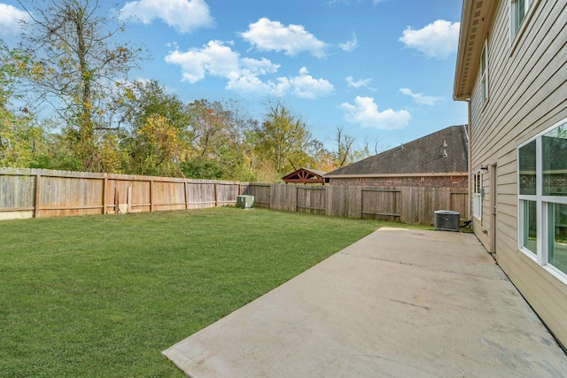 view of yard featuring a patio area and a fenced backyard